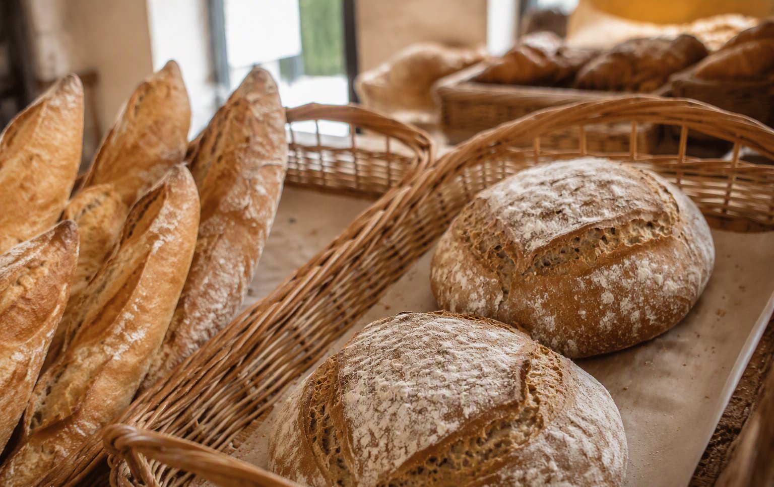 Fresh sourdough, baguettes, cinnamon rolls and Bulgarian Mekitza from the bakery